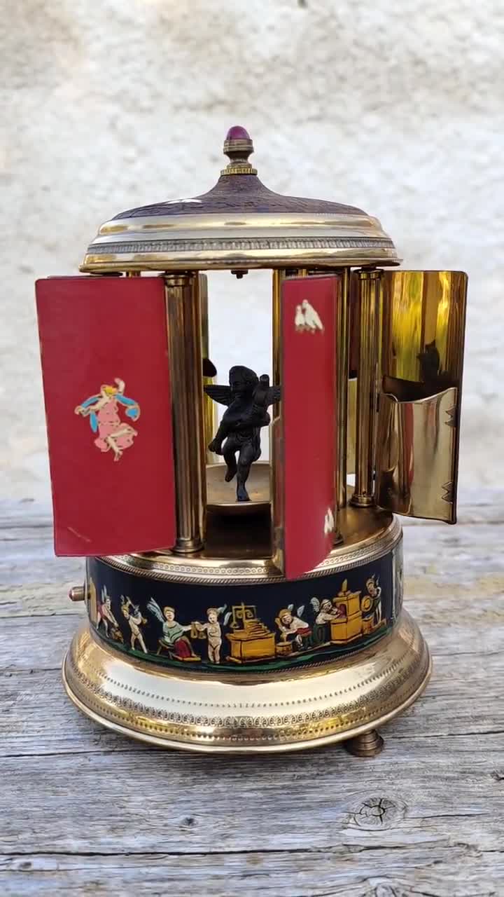 1960s musical cigarette carousel that I use as a lipstick holder