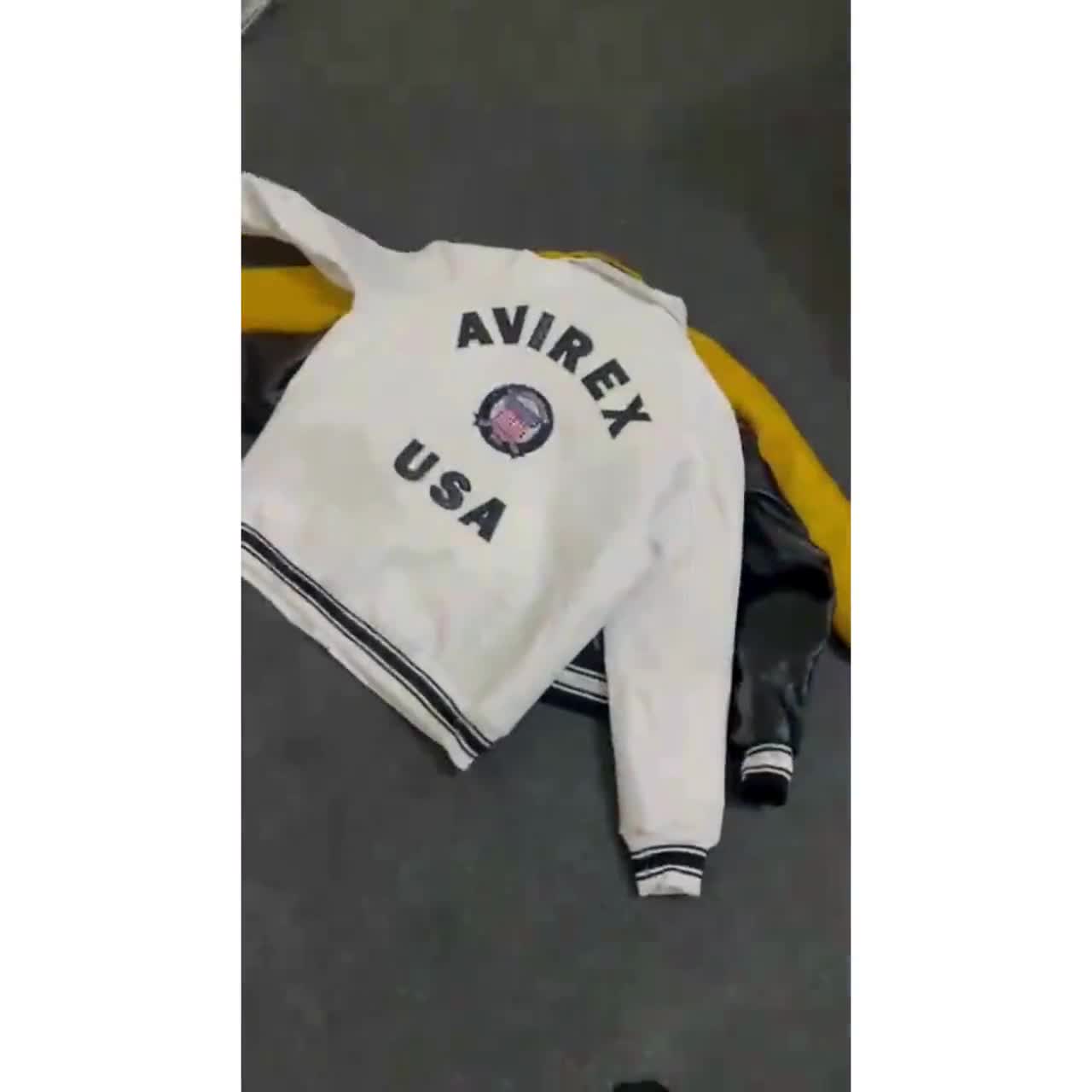 Avirex Varsity Leather Jacket Black Yellow | Leather Bomber Jacket | 1975 Avirex Style | Unisex streetwear jacket video poster