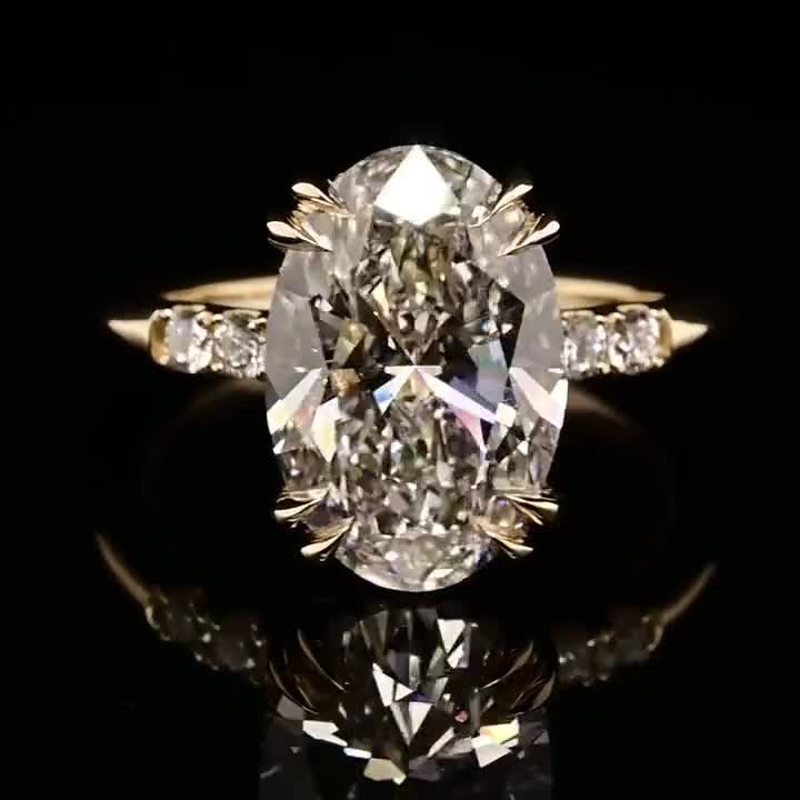 5 Carat Oval Diamond Engagement Ring – Double Claw Prong, IGI E VVS2 Yellow Gold video poster