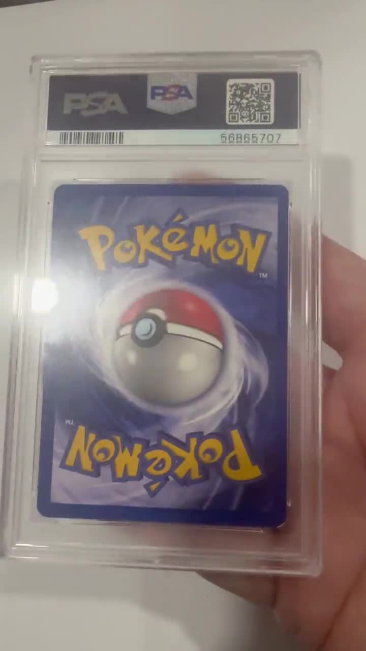 PSA 9 Pikachu 1999 Jungle #60 Pokemon Card Mint Graded Vintage WOTC Collectible video poster