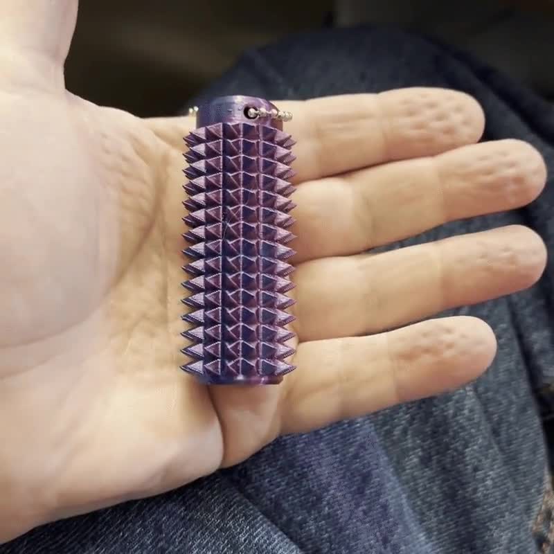 Rodillo antiestrés sensorial con púas - Estimulación para el alivio del dolor y la relajación - ¡Tamaño de la palma de la mano! video poster